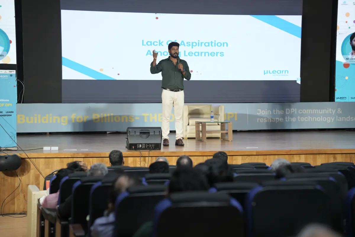 Audience of developers and entrepreneurs listening to a session on India Stack