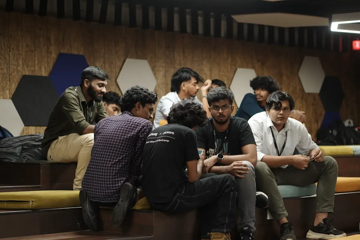 Participants brainstorming and sketching ideas on whiteboards